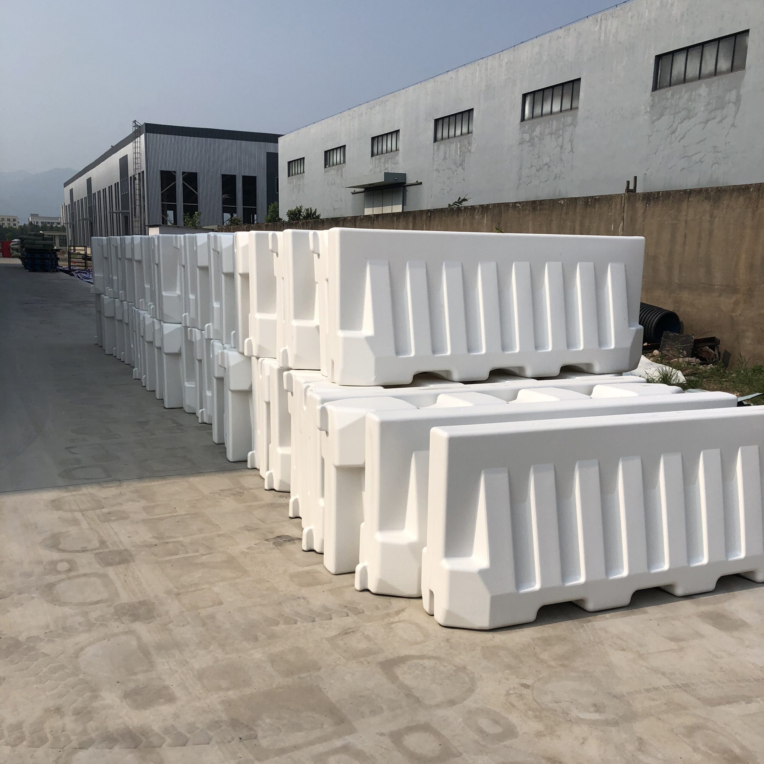 white-plastic-water-filled-barriers
